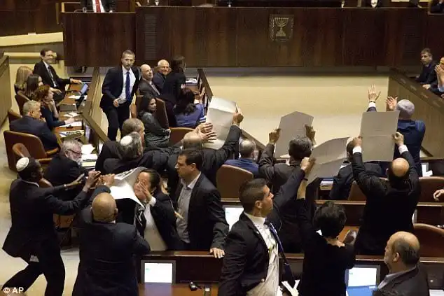 They also began shouting in protest at the Vice President's announcement that the United States embassy will move to Jerusalem next year 