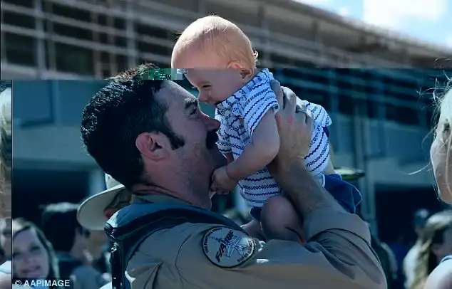 There were emotional scenes at the RAAF Amberley air base in Queensland on Wednesday as air force personnel were reunited with their loved ones after three and a half years away