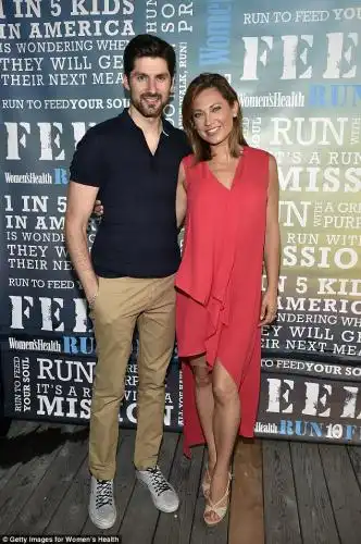 Mom and dad: Ginger and her husband Ben Aaron are also parents to son Adrian, two; pictured with Ben in August 2015 in NY