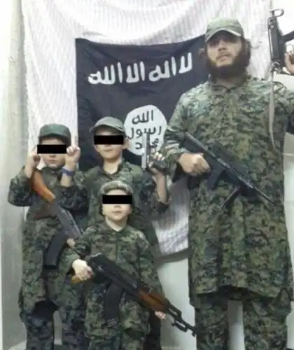A neighbour of Australian ISIS jihadist Khaled Sharrouf has taken a camera crew on a tour of a house when he kept Yazidi girls as prisoners