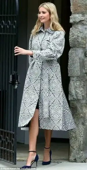 Ivanka was spotted leaving her house in Washington, D.C. and heading to the airport on Thursday, in a wrap coat featuring a navy and white dotted pattern