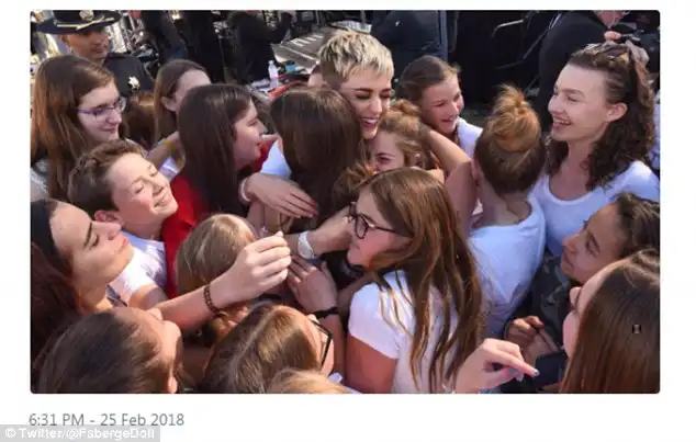 Surprise: The pop superstar, 33, was swamped by young fans as she attended the One 805 Kick Ash Bash at the Bella Vista Ranch in Summerland, just outside Santa Barbara, California