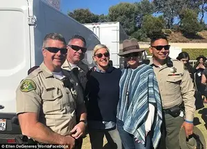 Big names: Also at the concert was local resident Ellen DeGeneres and her wife Portia de Rossi, who posed for photos with local law enforcement. The couple live in Montecito