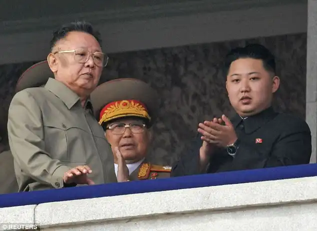 Kim Jong-un (right) has marked the 76th anniversary of his father Kim Jong-Il (left) at a ceremony in Pyongyang