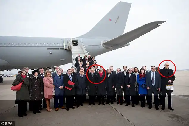 Chinese social media users have gone crazy for 'Auntie May'and acted with bewilderment after one of the business delegation was pictured holding baby formula