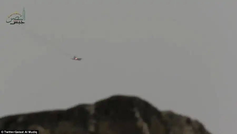 The pilot managed to eject from the plane and parachute to the ground unharmed but rebels swiftly killed him, according to reports
