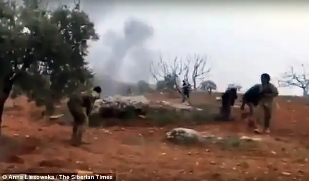No escape: Video shot by the Al-Nusra Front show the jihadists moving in on Roman Filipov, who opts to detonate a hand grenade rather than be captured