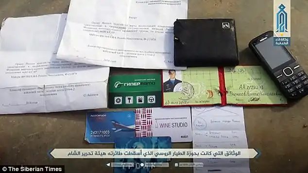 Proof: Documents belonging to Maj. Filipov appeared in footage shot by the jihadist rebels