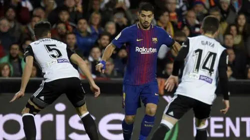 JOSE JORDAN/GettyImages FBL-ESP-CUP-VALENCIA-BARCELONA