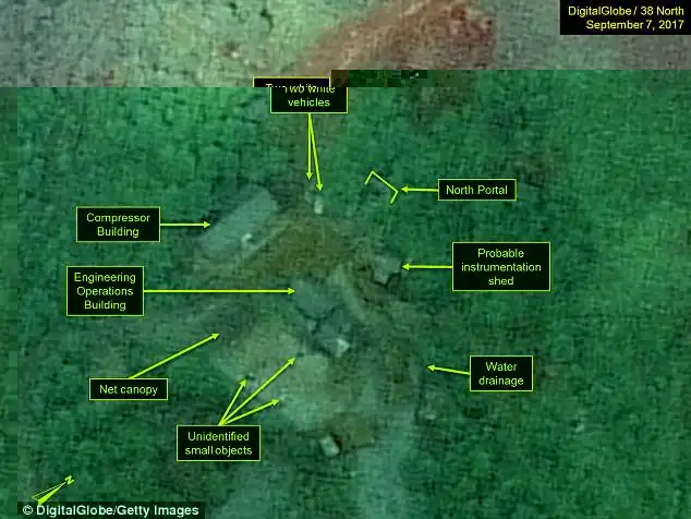 Pictures of the site on September 7  - days after the nuclear bomb testshow white vehicles near the North Portal under a net canopy