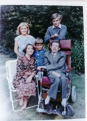 Hawking is pictured with his  children Robert, Lucy & Tim and his wife Jane 