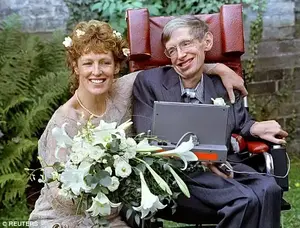 Hawking and his new bride Elaine Mason pose for pictures after the blessing of their wedding at St. Barnabus Church September 16, 1995