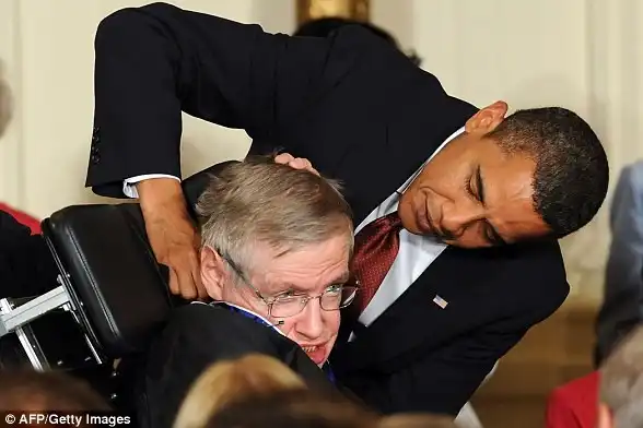 US President Barack Obama presents the Presidential Medal of Freedom to Hawking during a ceremony in the East Room in August 2009 