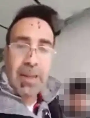 In the shocking video, he can be seen with blood on his face and a cut on his hand as he speaks breathlessly to the camera