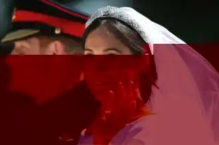 Prince Harry and Meghan Markle ride in an Ascot Landau along the Long Walk after their wedding in St George's Chapel in Windsor Castle.