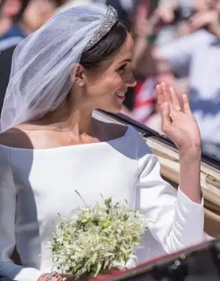 Prince Harry, Duke of Suss3x and Meghan, Duchess of Suss3x leave St George's Chapel, Windsor Castle after their wedding ceremony on 19 May 2018