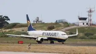 A Ryanair plane lands at Lisbon airport