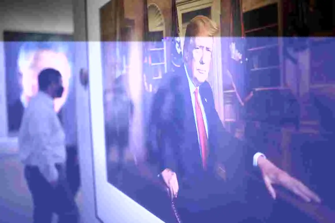 Patrons view a portrait of previous U.S. President Donald Trump in the America’s Presidents exhibition at the National Portrait Gallery