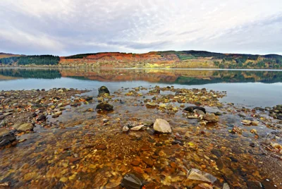 An autumn view of Loch Awe in the Scottish Highlands at low water. (Photo by: Peter Watson/Loop Images/Universal Images Group via Getty Images)