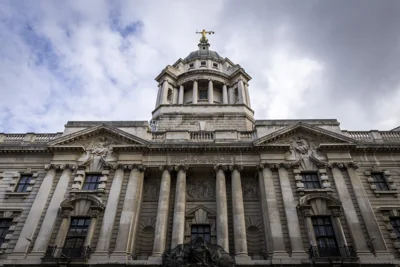 A gold statue of Lady Justice sits on top of the Central Criminal Court on the 11th of March 2025 in London, United Kingdom. The Central Criminal Court of England and Wales, commonly referred to as the Old Bailey after the street on which it stands, is a criminal court building in central London, one of several that house the Crown Court of England and Wales (photo by Andrew Aitchison / In pictures via Getty Images)