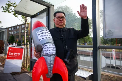 Mandatory Credit: Photo by Beata Zawrzel/NurPhoto/Shutterstock (15374268d) A man impersonating Kim Jong Un, , the leader of North Korea, is staging satirical protest on the street near the venue of the 76th NATO Summit in The Hague, Netherlands on June 25th, 2025. Kim Jong Un Impersonator During NATO Summit In The Hague, Netherlands - 25 Jun 2025