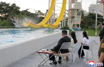 North Korean leader Kim Jong Un and his daughter Kim Ju Ae watch a person sliding down a slide during a ceremony to celebrate the completion of the Wonsan Kalma Coastal Tourist Zone, in Wonsan, North Korea.