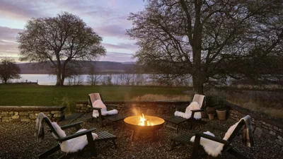 *UNDER STRICT EMBARGO, FIRST DIGITAL USE 08:00 (BST) Friday April 11 2025, FIRST PRINT USE Saturday April 12 2025* Exterior of Omaze Million Pound House Draw on the shores of Loch Rannoch in Perthshire. Release date April 10 2025. A gran has won a ?4m mansion in the Scottish Highlands and will celebrate - by watching Braveheart. Patricia Moule, 81, has scooped the Omaze Million Pound House Draw - a four bedroom property on the shores of Loch Rannoch in Perthshire. Widow Patricia from Southampton once shed five stone so she could give her husband of over 55 years David one of her kidneys for a lifesaving operation. The operation was a success, however, sadly David passed away from prostate cancer in 2019. Patricia says her late husband will be ?smiling down on the family? after she scooped the house along with ?250,000 in cash - for just ?25.