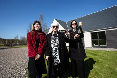 *UNDER STRICT EMBARGO, FIRST DIGITAL USE 08:00 (BST) Friday April 11 2025, FIRST PRINT USE Saturday April 12 2025* Patricia Moule, middle, Omaze Winner outside her new ??4m home in Scotland. With grand daughter Louisa, left, and Daughter Sarah on right. Release date April 10 2025. A gran has won a ??4m mansion in the Scottish Highlands and will celebrate - by watching Braveheart. Patricia Moule, 81, has scooped the Omaze Million Pound House Draw - a four bedroom property on the shores of Loch Rannoch in Perthshire. Widow Patricia from Southampton once shed five stone so she could give her husband of over 55 years David one of her kidneys for a lifesaving operation. The operation was a success, however, sadly David passed away from prostate cancer in 2019. Patricia says her late husband will be ???smiling down on the family??? after she scooped the house along with ??250,000 in cash - for just ??25.