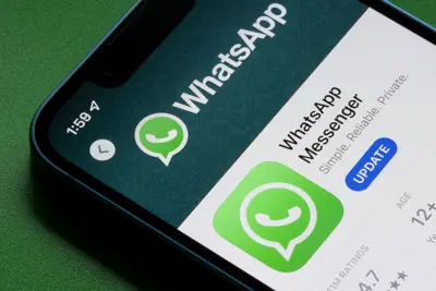 WhatsApp Messenger app displayed on an iPhone in the App Store.