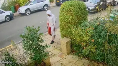 CCTV footage shows Javan Lee, covered in blood, walking on a street after the murder