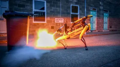 Robot dogs being tested by the UK Ministry of Defence to defuse explosives, highlighting advancements in military robotics.
