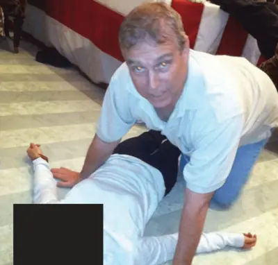 A photograph from the Epstein files showing Prince Andrew with an unidentified woman.