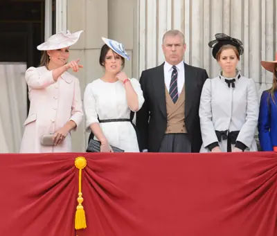 Prince Andrew with his two daughters Princess Beatrice and Princess Eugenie on the Buckingham Palace balcony.