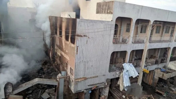 Firefighters tackling the large blaze at Kano's Singer Market.