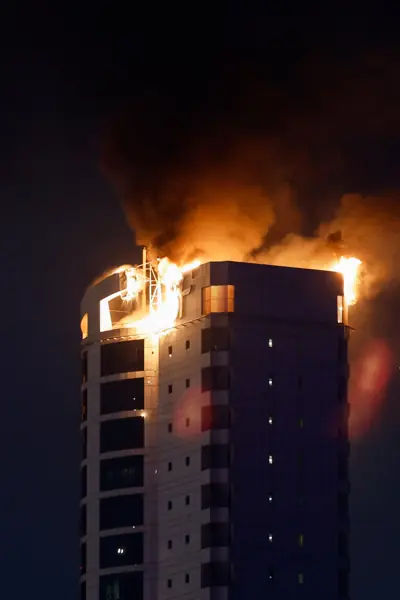 Smoke rises from a building in Manama, Bahrain, after an Iranian drone strike.