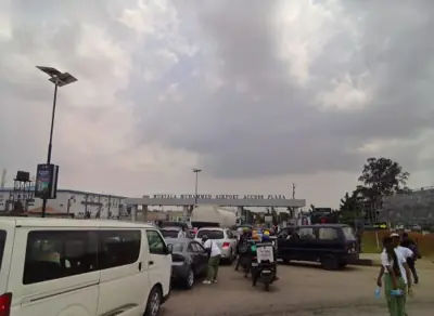Vehicles queuing at Lagos Airport entrance amidst cashless policy implementation Vehicles queuing at Lagos Airport entrance amidst cashless policy implementation